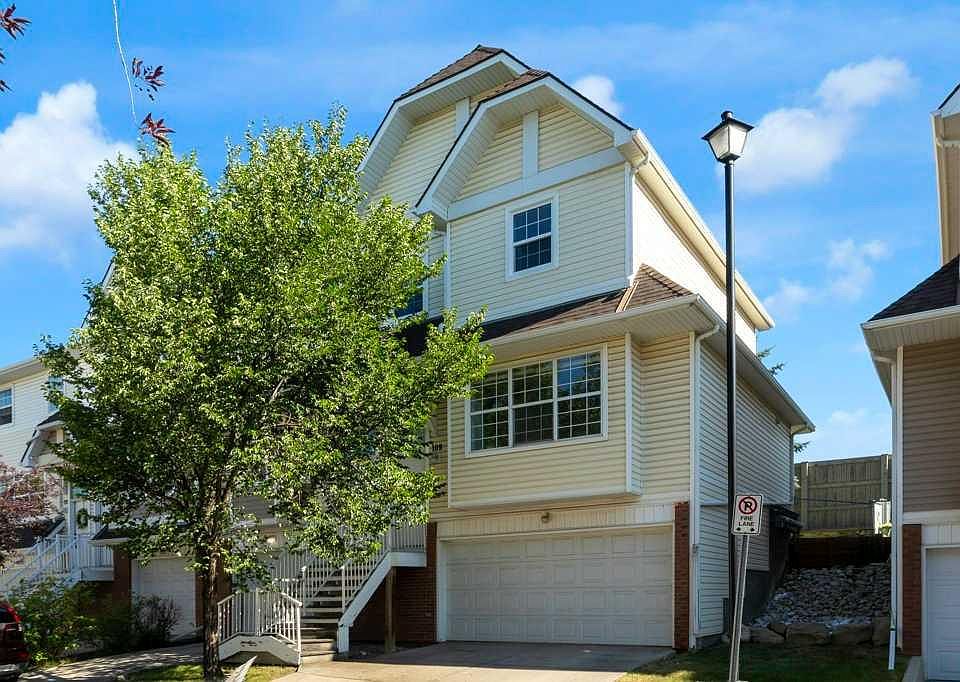 1st image of 109 S Tuscany Springs Gdns NW