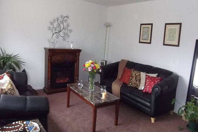 Spacious Living Room with plenty of natural of light throughout