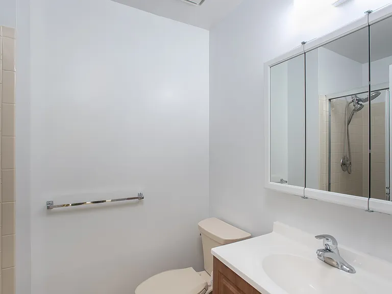 Ensuite bathroom with stall shower