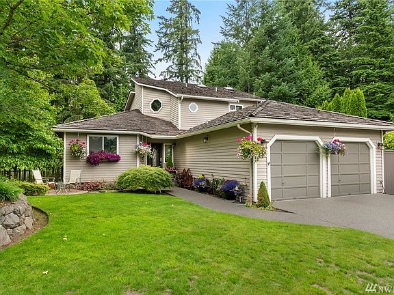 Two-story home with finished basement in a memorable and natural setting nestled off a cul-de-sac.