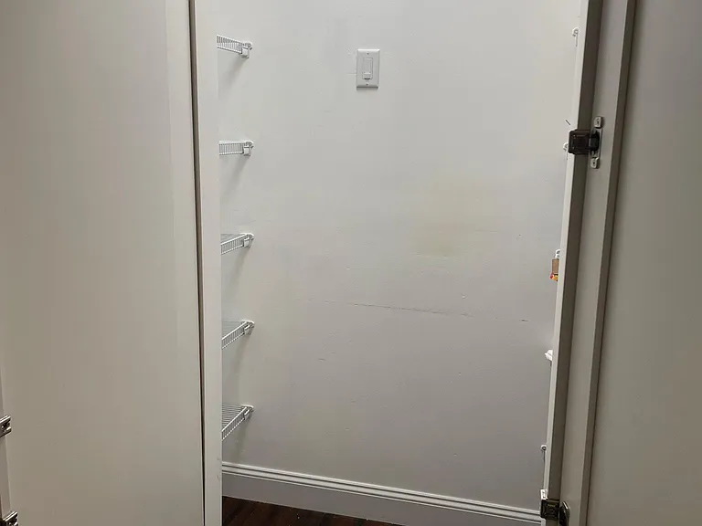 Cool hidden walk-in pantry w Motion detection lighting
