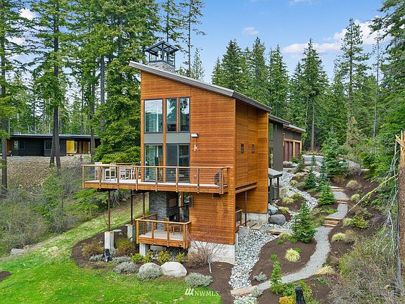 Low maintenance landscaping including a drip irrigation system.>