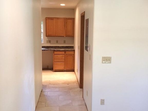 Living room looking into kitchen