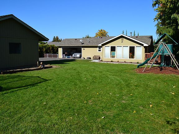 Back yard, shop at left.