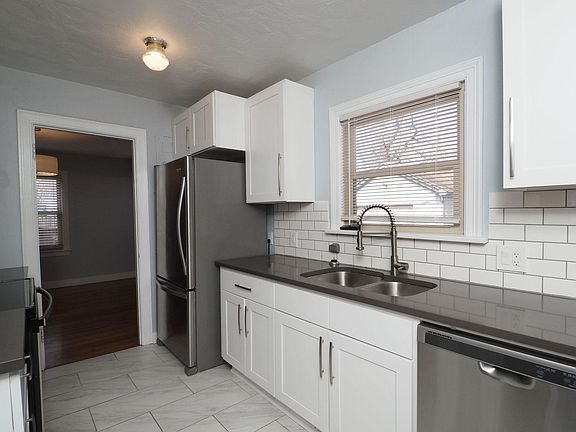 Whirlpool appliances:
 Ice maker
 Electric stove
 Microwave
 Dishwasher

Quartz countertops
Shaker style cabinets