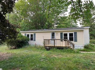 6114 Harper Rd NW, Rapid City, MI 49676