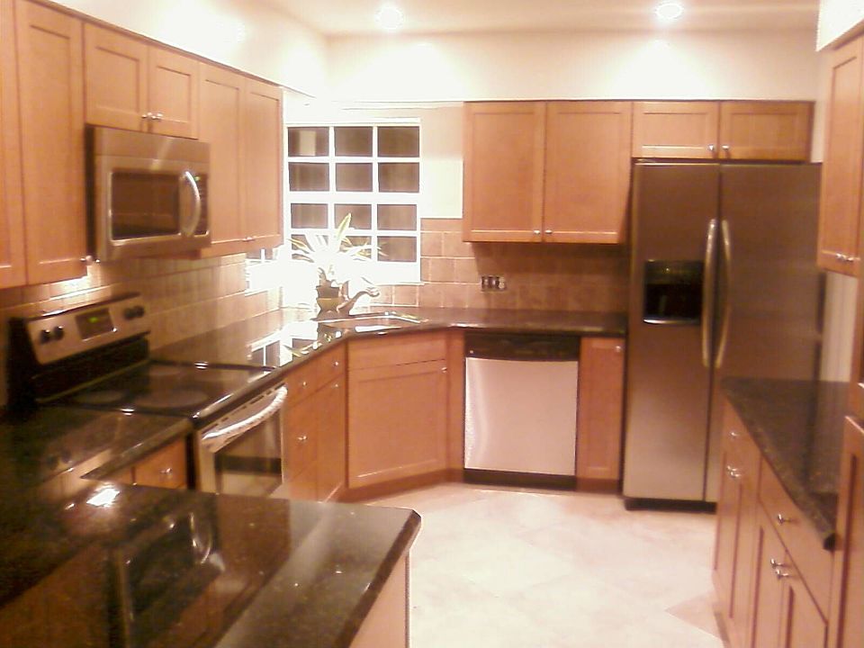 granite counters, ss appliances, maple cabinets