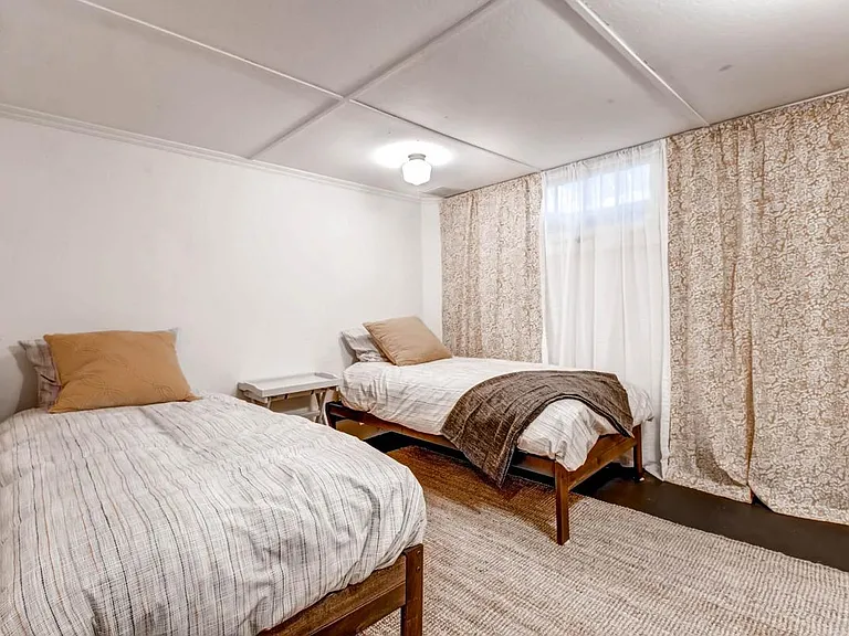 Singles and Kids Have Twin Beds in the Downstairs Bedrooms
