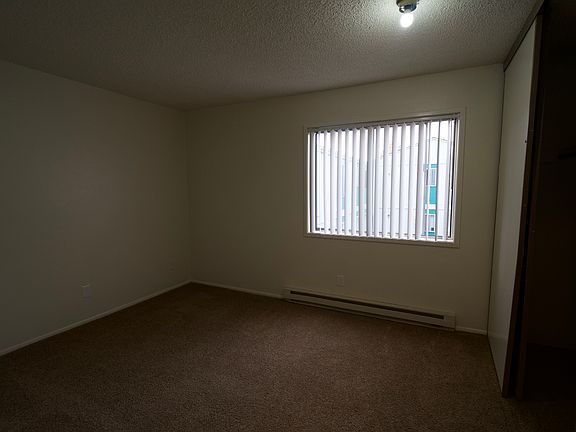 Bedroom with wall length, deep closet.