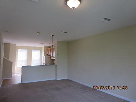 loving room w/ view of kitch