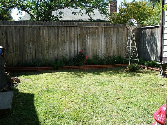 Private, fully landscaped yard with auto irrigation