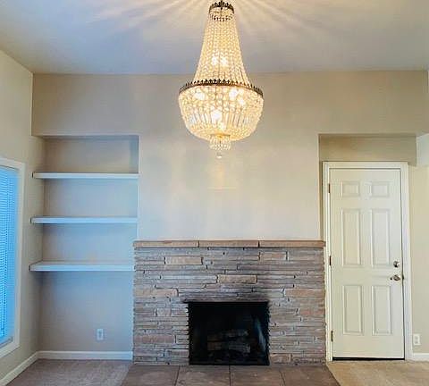 Front Entrance Living Room with Fireplace