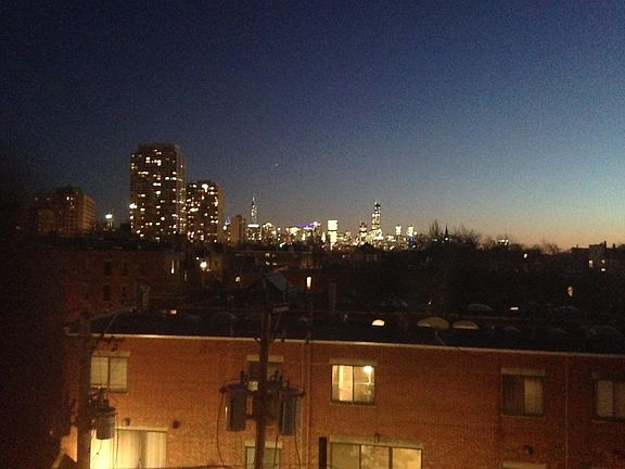 A beautiful night skyline of Chicago from the living room window.
