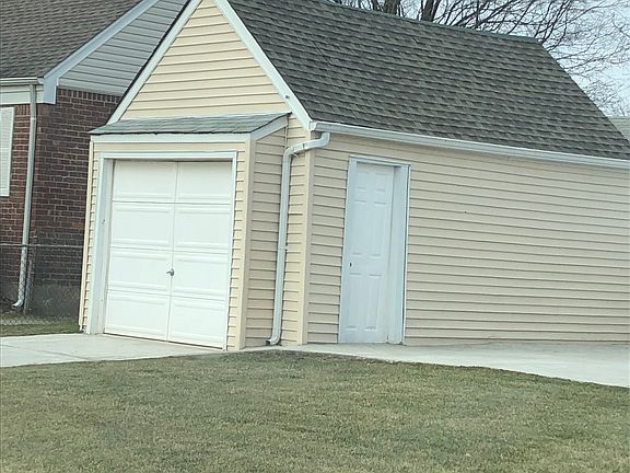 Detached garage and driveway