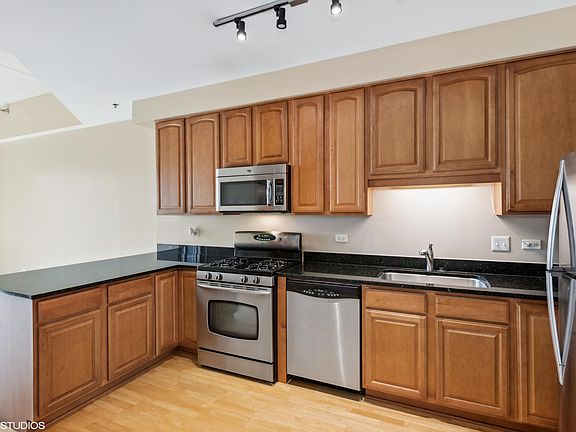 Wide Open Kitchen Granite Counters & SS Appliances