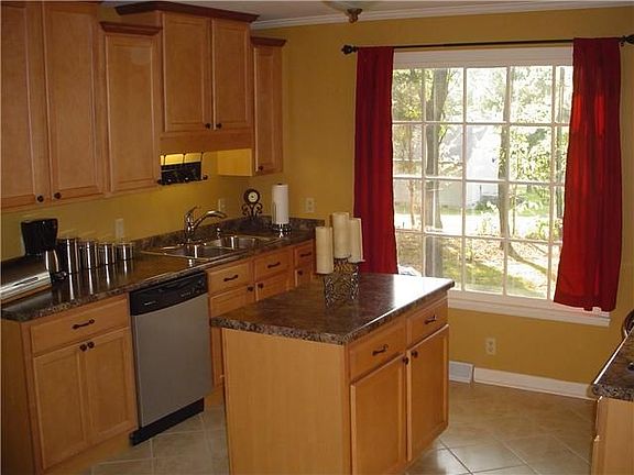 Completed remodeled kitchen with stainless steel appliances