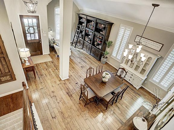 Inviting gleaming hardwoods greet you as you enter this beautifully updated home.