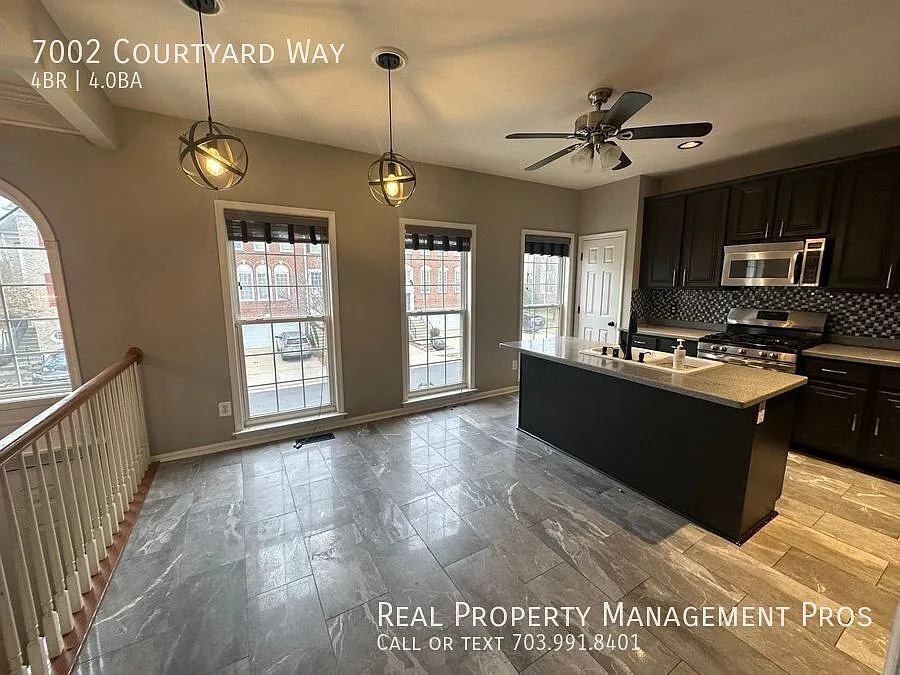 Building Photo - 7002 Courtyard Way