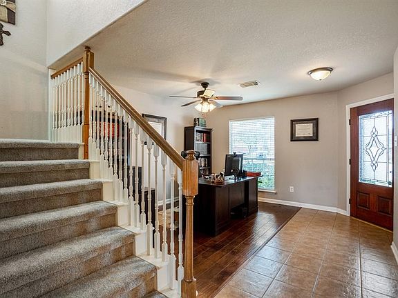 A view looking towards the front of the home, shows how much natural light streams in.