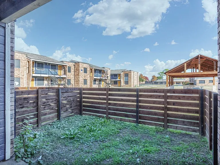 Private patio with fenced area for added privacy