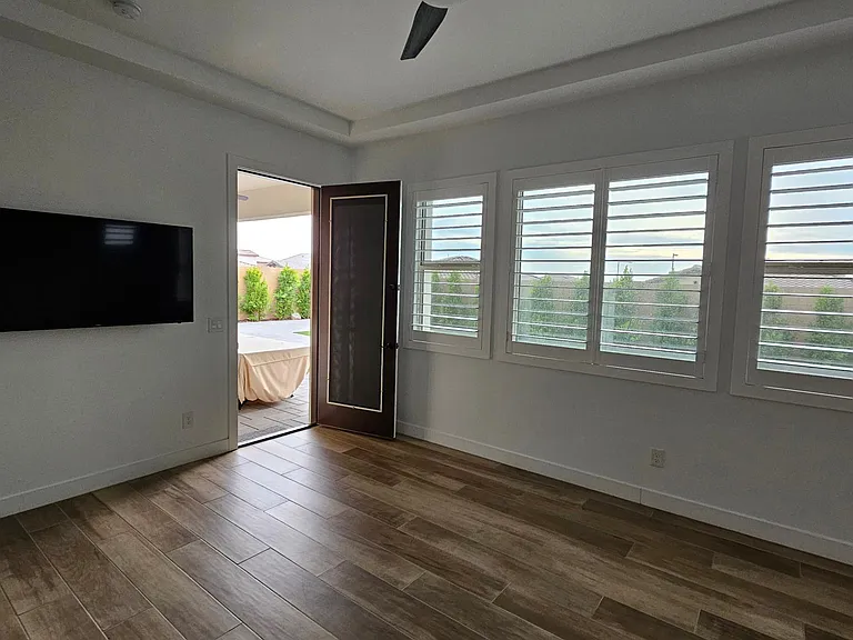 Primary bedroom with direct access to backyard
