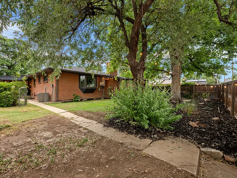 Back fence leads to alleyway on corner lot