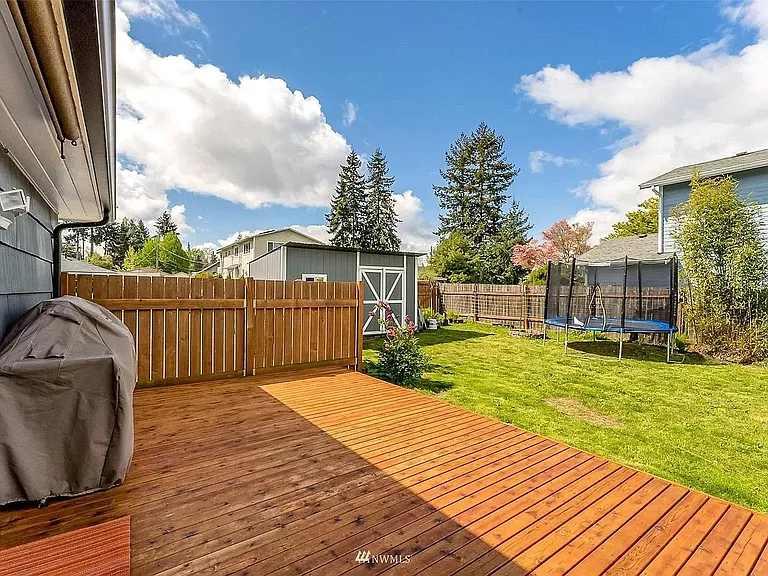 back deck with view of shed