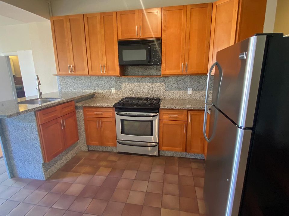 Kitchen - door on left is full bathroom
