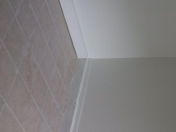 Ceramic Floor Tile in Bedroom. Why Is This Photo Sideways?