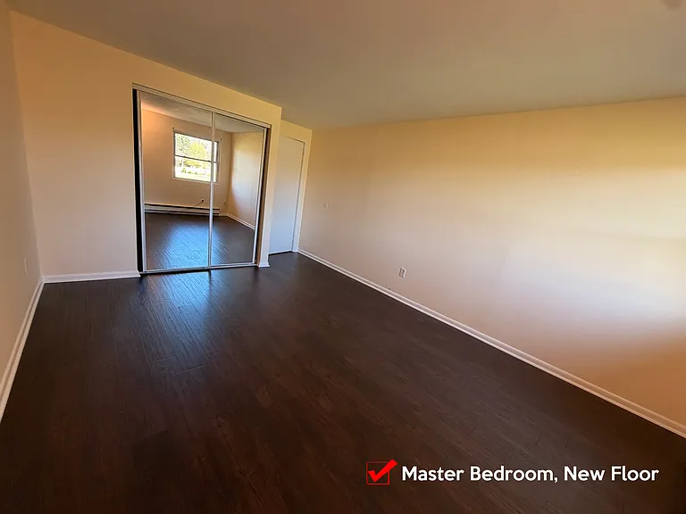 Master Bedroom, New Hard Floor, fresh new paint.