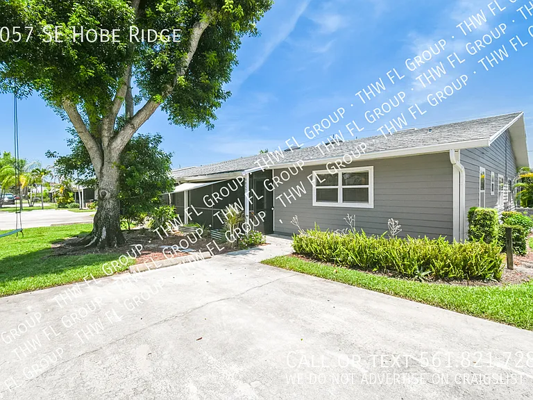 9057 SE Hobe Ridge Ave — Photo 1