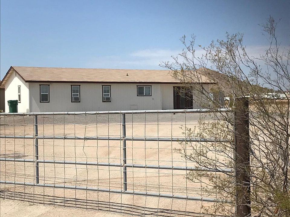 Fenced around with gate.