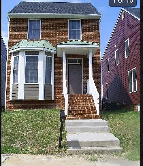 Front of House - one block from community center, with playground, tennis courts, basketball courts and public swimming pool.