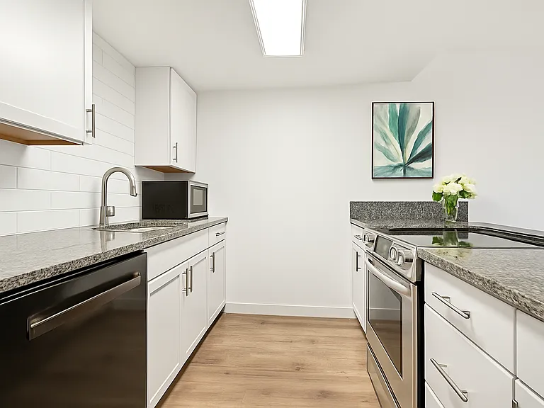 This spacious kitchen offers everything you need to feel at home. Appliances, generous counter space, and a layout that makes cooking easy and enjoyable.