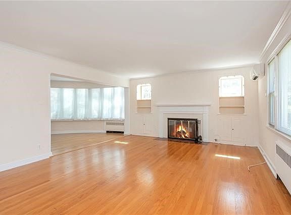 Another view of the living room and sitting area(perfect for the reader or musician)