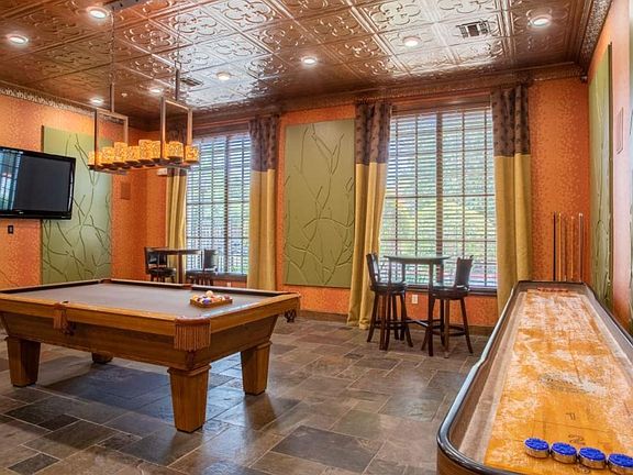 Come play a game of shuffleboard or pool.