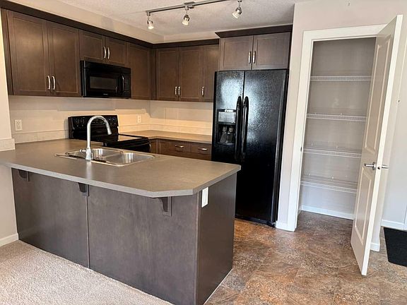 5th image of 402 Kincora Glen Rd NW #3307