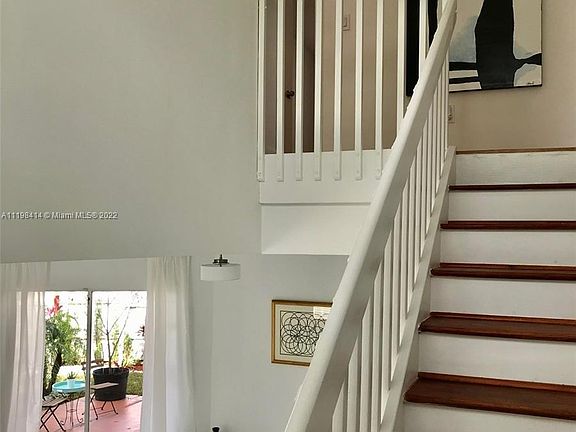 FOYER ENTRY VIEW. MAIN LIVING AREA ON FIRST FLOOR AND 4 BEDROOMS AND 2 BATHROOMS ON SECOND FLOOR.