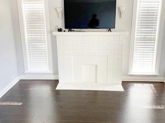 Living Room with faux fireplace