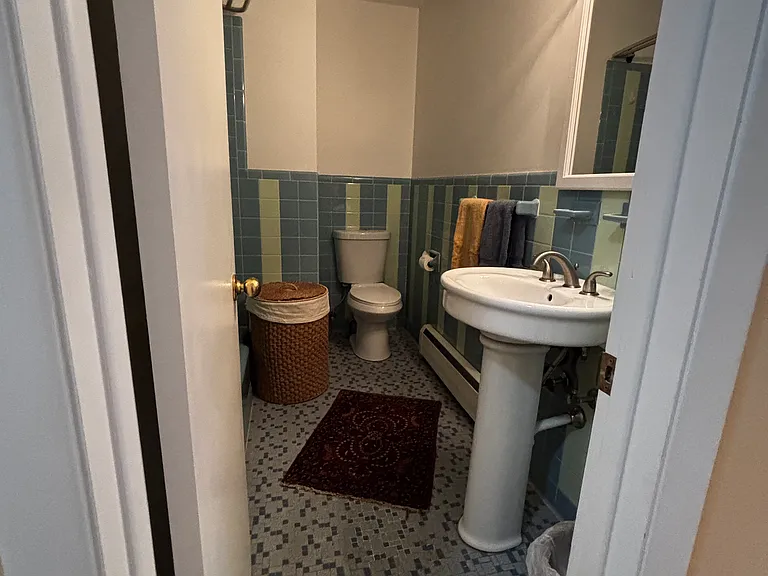 Second full bath with laundry chute!