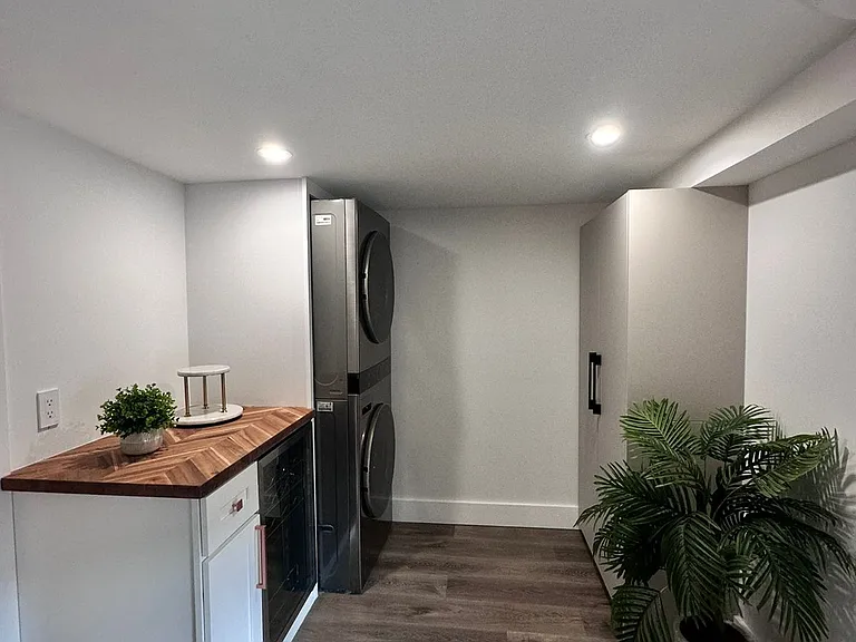 Warm and stylish laundry area with convenient amenities for comfort.