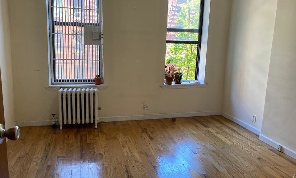 1st image of 70 E 7th St APT 1B