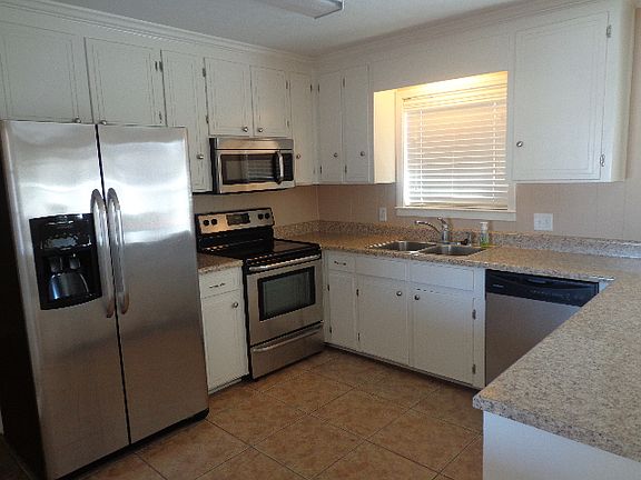 Remodeled kitchen with new appliances.