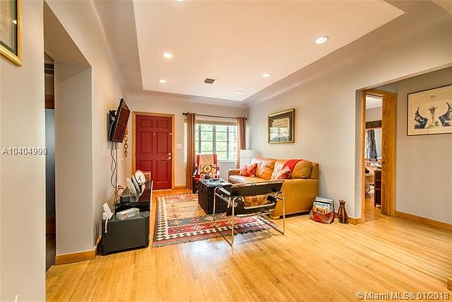 Charming bungalow on a quiet, tree-lined, cul-de-sac street in prestigious North Coconut Grove