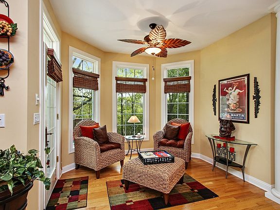 SITTING AREA OFF OF KITCHEN OVER LOOKING STUNNING GROUNDS