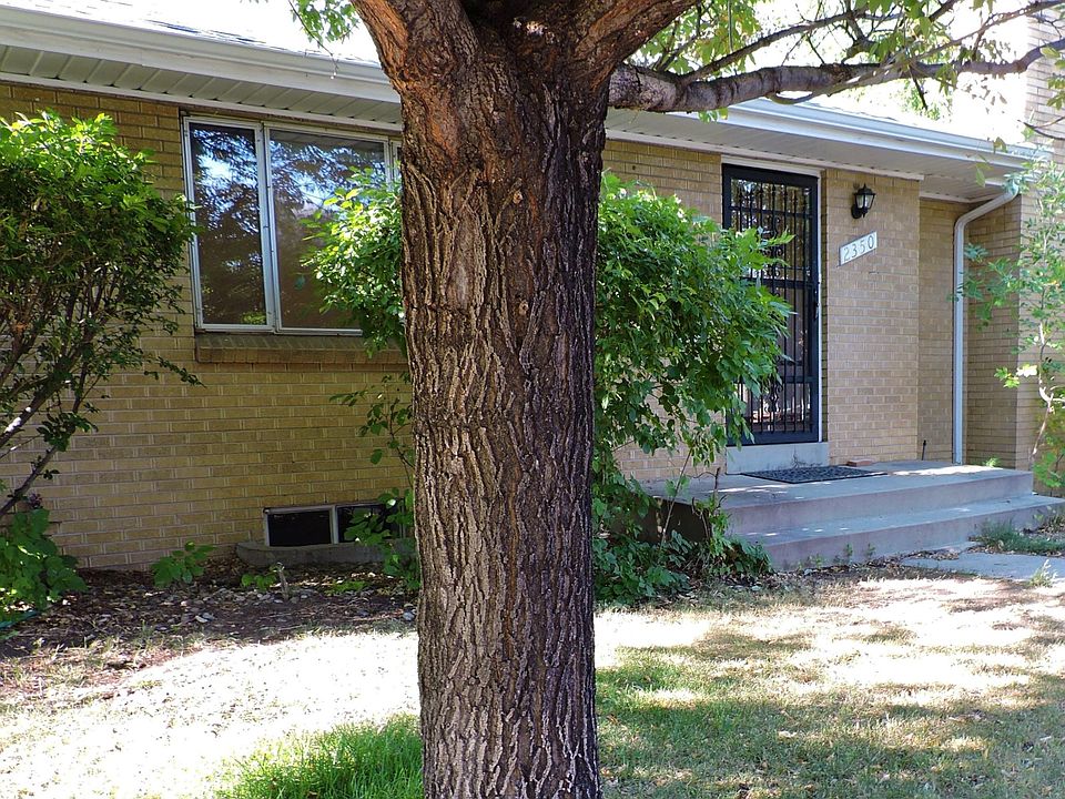 view from street near alley parking area
