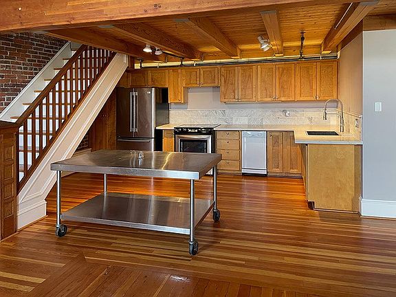 Marble counters, stainless steel appliances and a dishwasher!