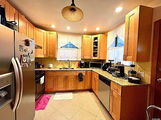 2nd image of 52-12 67th St #1