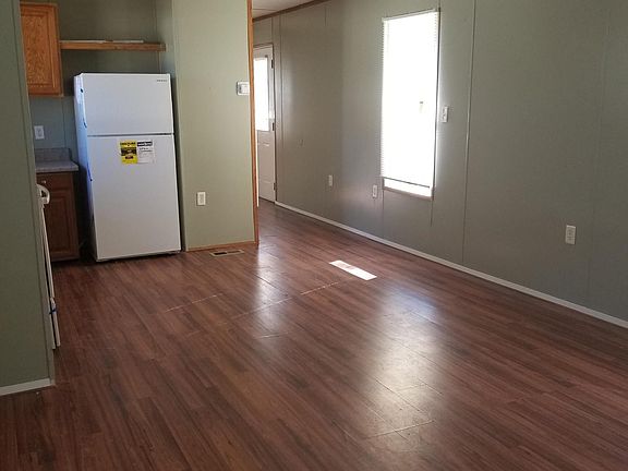 This is your view as you enter into the home. Kitchen and Living room