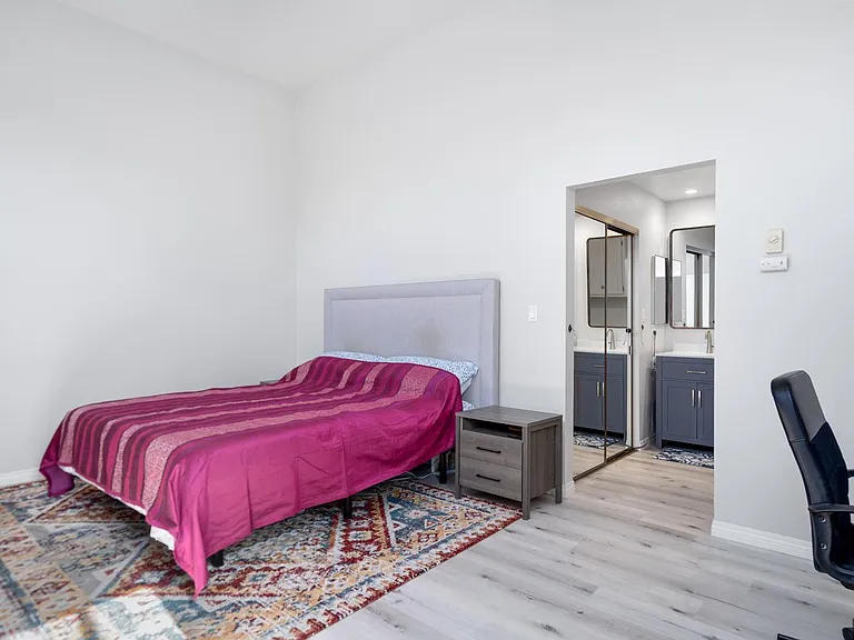 Expansive upstairs master bedroom with walk-in closet and ensuite bathroom